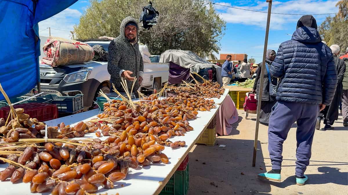 Djerba Midoun Market Man selling Dates at the market in Djerba Midoun
